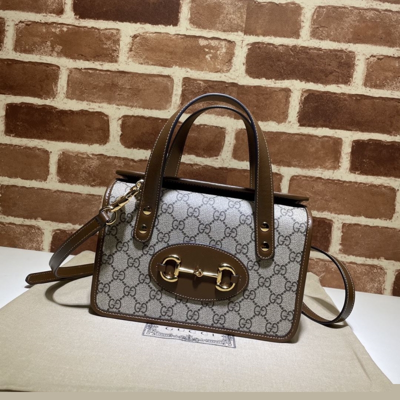 G*u*i top handle bags